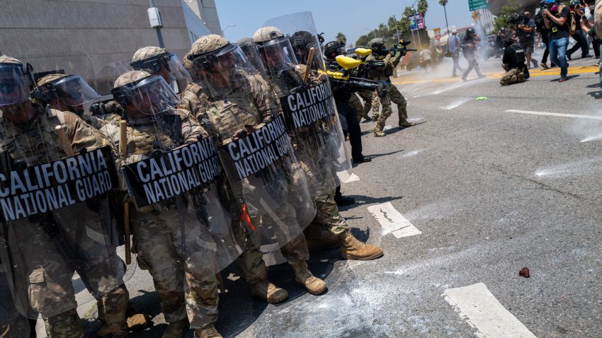 LOS ANGELES, CALIFORNIA – JUNE 08: Demonstrators protest outside a downtown jail in Los Angeles following two days of clashes with police during a series of immigration raids on June 08, 2025 in Los Angeles, California. Tensions in the city remain high after the Trump administration called in the National Guard against the wishes of city leaders. (Photo by Spencer Platt/Getty Images)