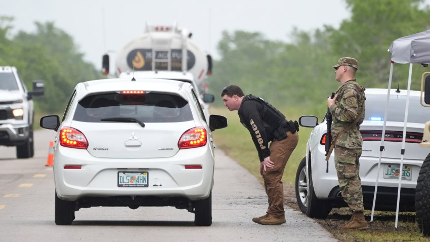 Police check cars arriving