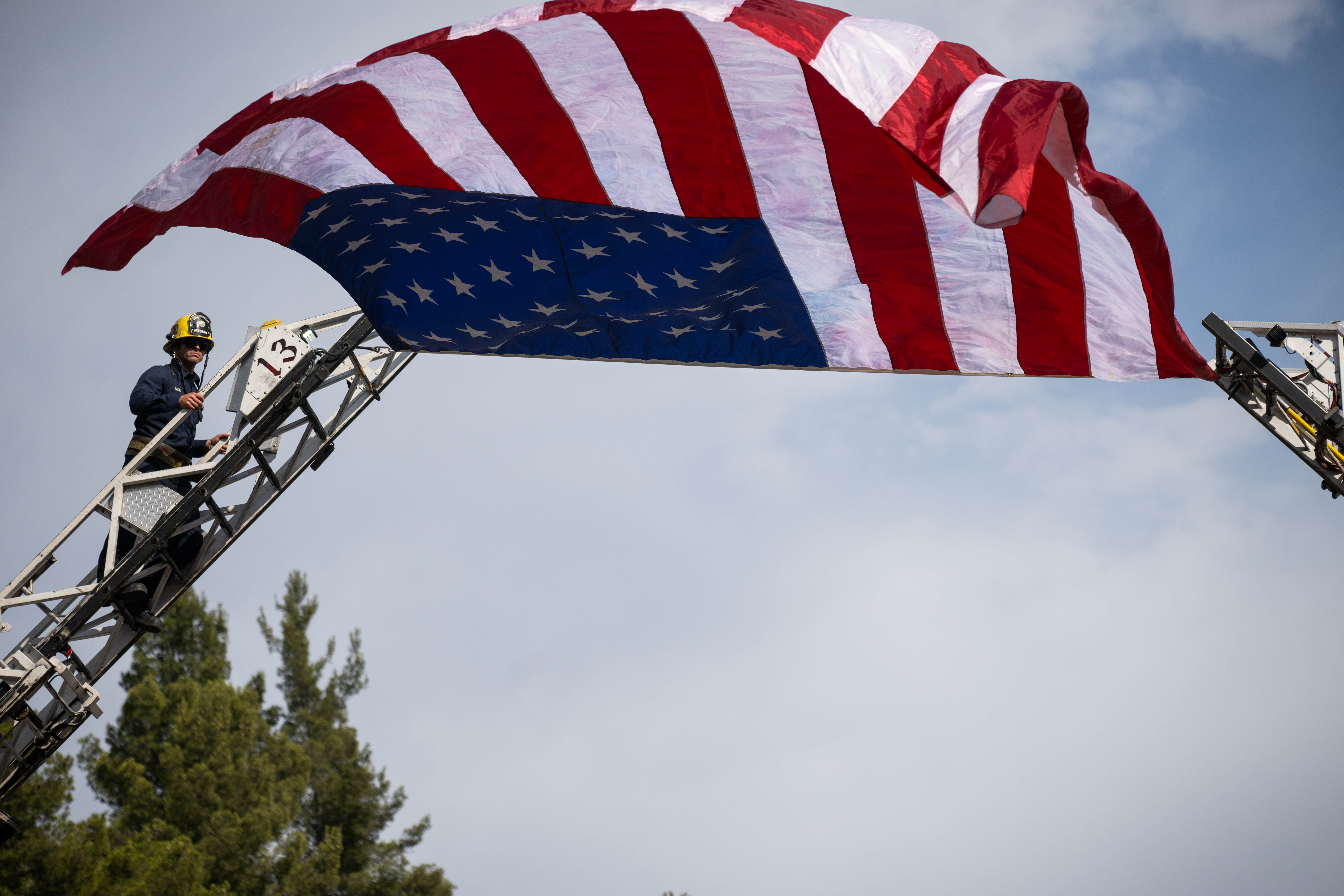 Somber moments from procession for 3 fallen LASD deputies – NBC Los Angeles