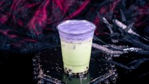 Halloween Time at the Disneyland Resort in Anaheim, Calif. begins Aug. 22, 2025 to Oct. 31, 2025. Iced Pandan Cooler at Bengal Barbecue: with brown sugar spheres and ube cold foam