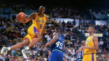 INGLEWOOD, CA - JANUARY 20: Kobe Bryant #8 of the Los Angeles Lakers goes to the basket against the Dallas Mavericks on January 20, 1997 at the Great Western Forum in Inglewood, California. NOTE TO USER: User expressly acknowledges and agrees that, by downloading and/or using this photograph, user is consenting to the terms and conditions of the Getty Images License Agreement. Mandatory Copyright Notice: Copyright 1997 NBAE (Photo by Andrew D. Bernstein/NBAE via Getty Images)