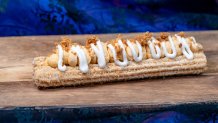 Halloween Time at the Disneyland Resort in Anaheim, Calif. begins Aug. 22, 2025 to Oct. 31, 2025. Pumpkin Pie Churro at Cozy Cone 1: Churros: Classic churro topped with pumpkin cream and pie crust pieces (David Nguyen/Disneyland Resort)