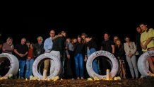 Malibu, CA, Tuesday, November 14, 2023 - A traffic safety group, Streets Are For Everyone hosts a ``Ghost Tire Memorial'' placement in memory of the victims of a reckless driver who killed four Pepperdine students. Parents, friends and classmates attend the ceremony, adding written thoughts to the tires, placed alongside Pacific Coast Highway. (Robert Gauthier/Los Angeles Times via Getty Images)
