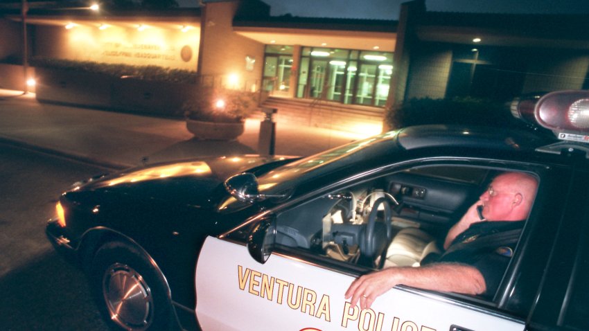 Ventura Police Lt. Dave Inglis makes a call on his cell phone from his car during night watch commander duties in Ventura. Ventura Police is the only organization in the county where the watch commander patrols in cars during their shift.  (Photo by Joe Pugliese/Los Angeles Times via Getty Images)
