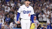 Los Angeles Dodgers defeated the Cincinnati Reds 8-4 to win game 2 of a wild card series baseball game and advance to the NLDS.