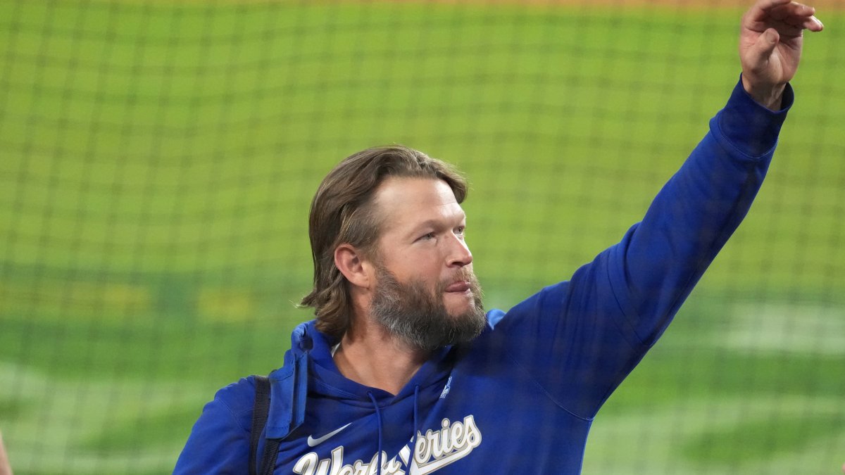Clayton Kershaw lingered on the field at Dodger Stadium after the team's 6-1 loss to Toronto in Game 5 of the World Series.
