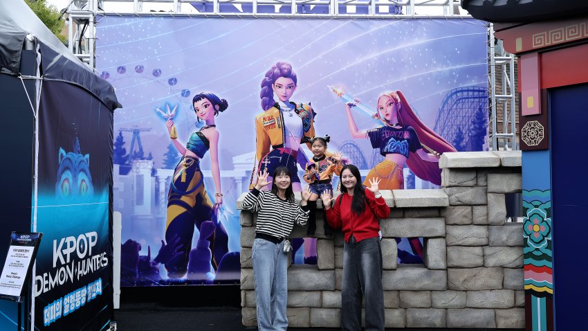 YONGIN, SOUTH KOREA – SEPTEMBER 30: Models pose for photographs at the KPop Demon Hunters themed zone at Everland on September 30, 2025 in Yongin, South Korea. The park opened a new themed zone on 26 September, in collaboration with Netflix, which features attractions inspired by the animated feature film KPop Demon Hunters. (Photo by Han Myung-Gu/WireImage)