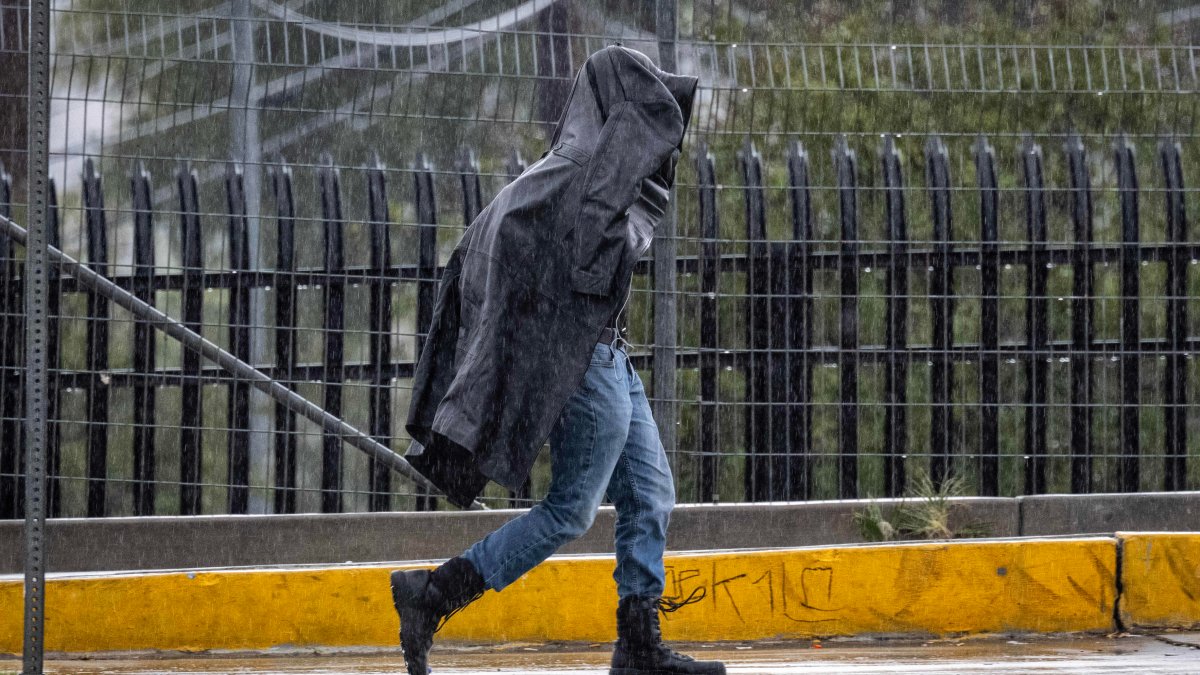 Isolated heavy downpours, wind gusts up to 50 mph, lightning and even a remote chance of a tornado are expected through Friday.