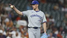 Apr 22, 2025; Houston, Texas, USA; Toronto Blue Jays starting pitcher Chris Bassitt (40) reacts after a play during the first inning against the Houston Astros at Daikin Park. Mandatory Credit: Troy Taormina-Imagn Images