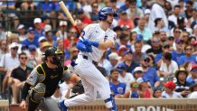 Aug 16, 2025; Chicago, Illinois, USA; Chicago Cubs right fielder Kyle Tucker (30) hits a single during the eighth inning against the Pittsburgh Pirates at Wrigley Field. Mandatory Credit: Patrick Gorski-Imagn Images