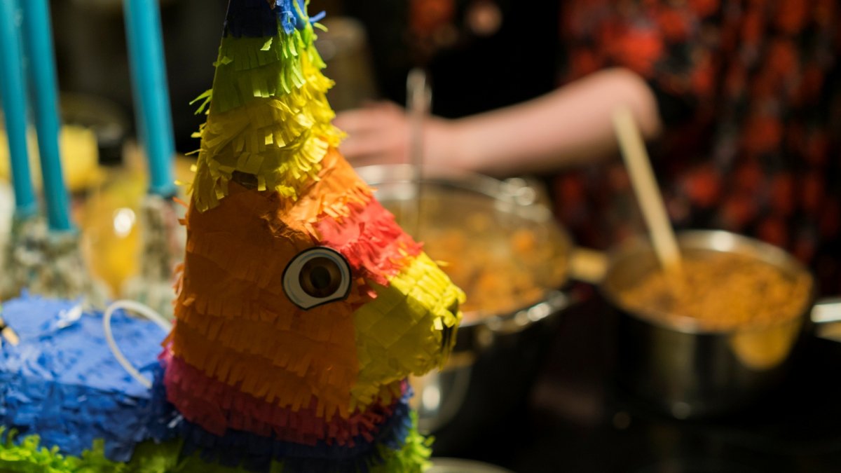 Piñatas, champurrado, music, meaning: ‘Las Posadas' at Olvera Street begins