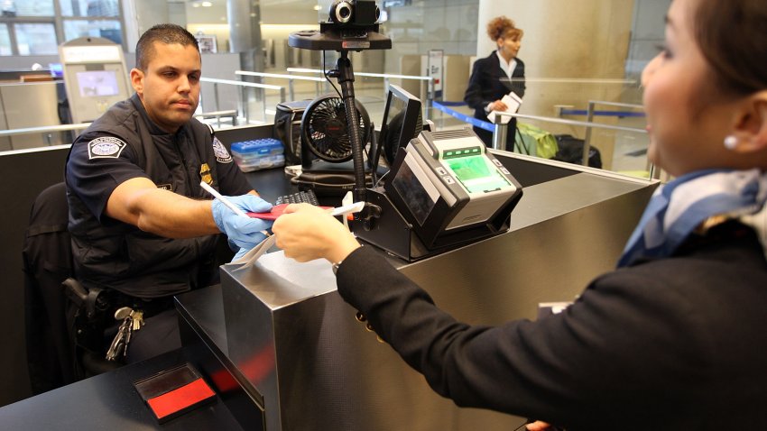 LOS ANGELES, CA – DECEMBER 10: International air travelers are processed by US Customs and Border Protection agents upon arrival to Bradley International Terminal at Los Angeles International Airport (LAX), on December 10, 2009 in Los Angeles, California. December is the busiest time of the year for international travel and CBP is trying to educate the public on ways to get through the customs process efficiently. (Photo by David McNew/Getty Images)