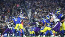 GLENDALE, ARIZONA - JANUARY 13: Matthew Stafford #9 of the Los Angeles Rams throws a pass during the third quarter against the Minnesota Vikings during the NFC Wild Card Playoff at State Farm Stadium on January 13, 2025 in Glendale, Arizona.  (Photo by Christian Petersen/Getty Images)