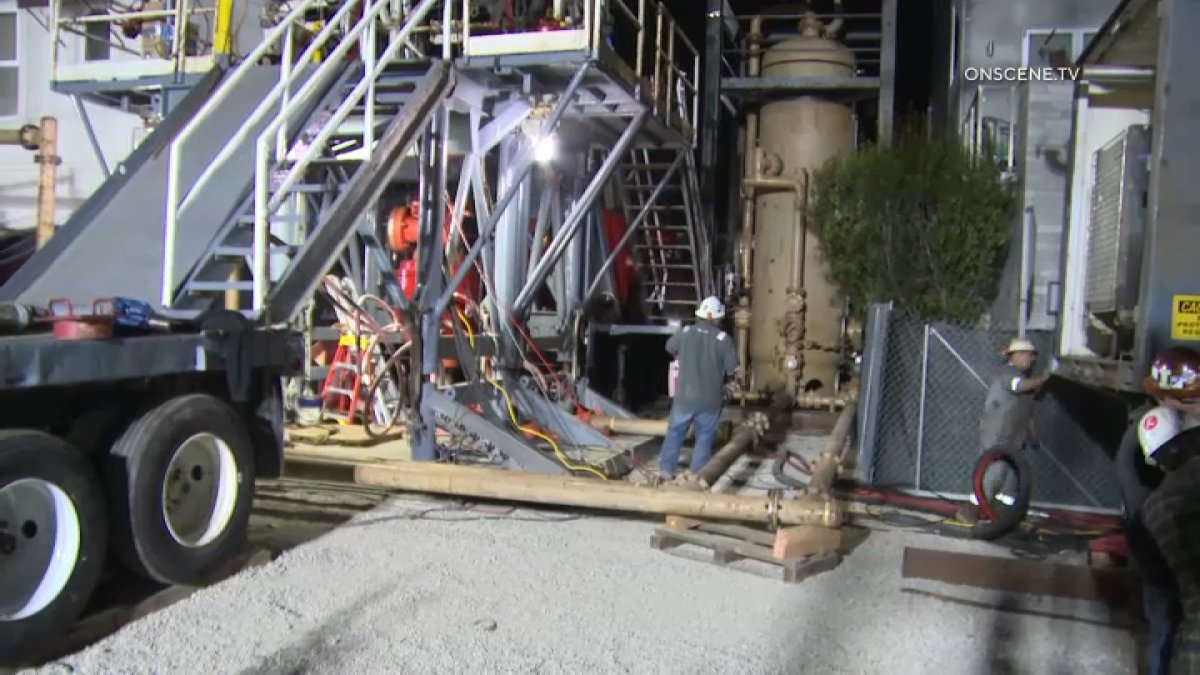 Crews in Newport Beach are conducting a drilling operation to fix an abandoned oil well that leaked methane and oil into a home on the Balboa Peninsula.