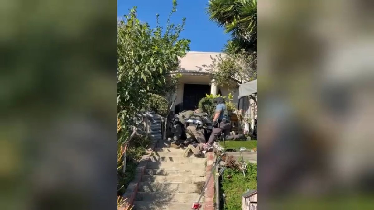 Man detained by federal agents at the doorstep of his Silver Lake home