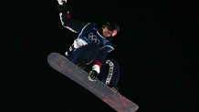 USA's Oliver Martin competes in the snowboard men's big air