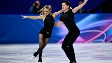 USA's Emilea Zingas and USA's Vadym Kolesnik compete in the figure skating team event ice dance-rhythm dance during the Milano Cortina 2026 Winter Olympic Games at Milano Ice Skating Arena in Milan on February 9, 2026. (Photo by JULIEN DE ROSA / AFP via Getty Images)
