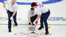 Luc Violette, Ben Richardson, and Aidan Oldenburg of the United States during a men's curling round