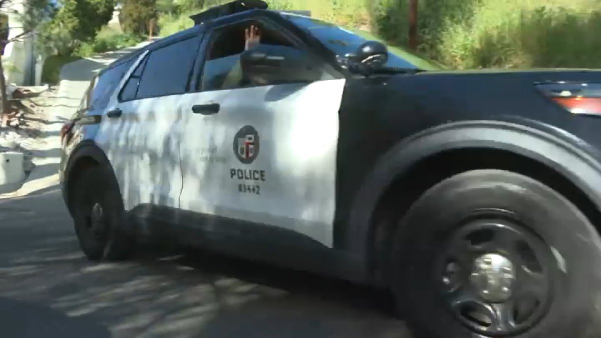 Group approaches parked car before man shot in Granada Hills, police say