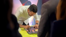 LA artist Thieb Delaporte-Richard's signing session during the “One Year to Go” event organized by the Los Angeles World Cup 2026 Host Committee in June 2025.