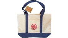 Trader Joe's classic large canvas bag in navy blue. The brand is releasing a version of this bag in a lavender color soon.