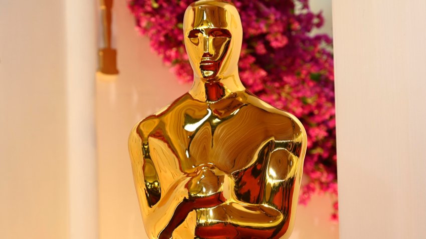 A large Oscars statue is seen on the red carpet as preparations continue for the 96th Oscars at the Dolby Theatre at Ovation Hollywood in Los Angeles