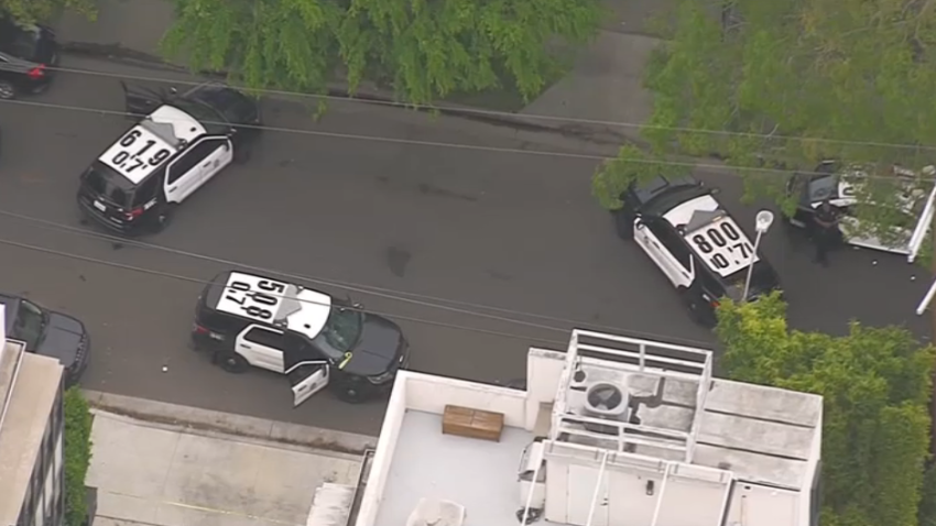 LAPD patrol vehicles at the scene of a shooting Tuesday March 10, 2026 in Mid-City.