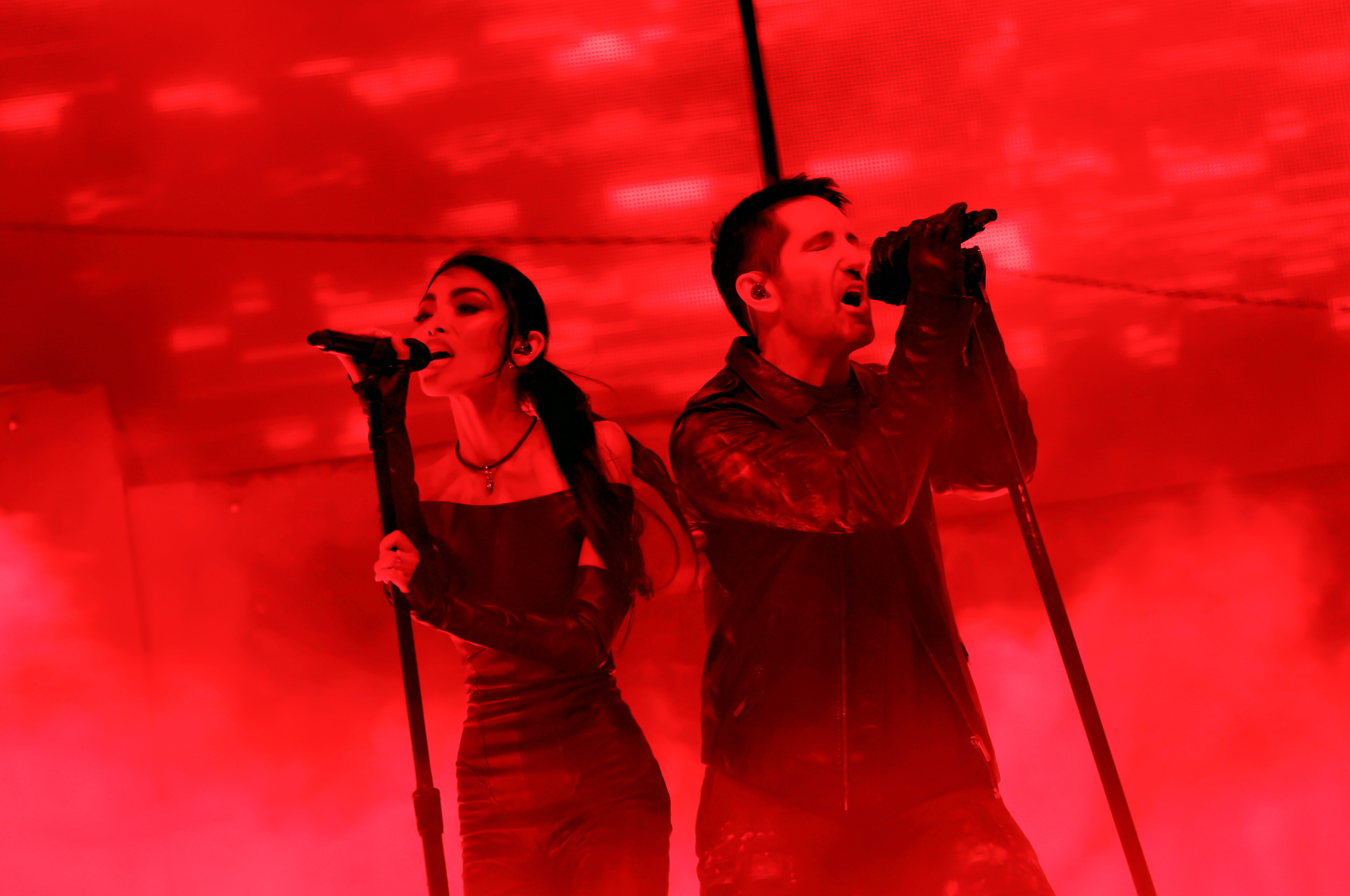 INDIO, CALIFORNIA – APRIL 11: Mariqueen Maandig and Trent Reznor of Nine Inch Noize perform at the Sahara Tent during the 2026 Coachella Valley Music and Arts Festival at Empire Polo Club on April 11, 2026 in Indio, California. (Photo by Matt Winkelmeyer/Getty Images for Coachella)