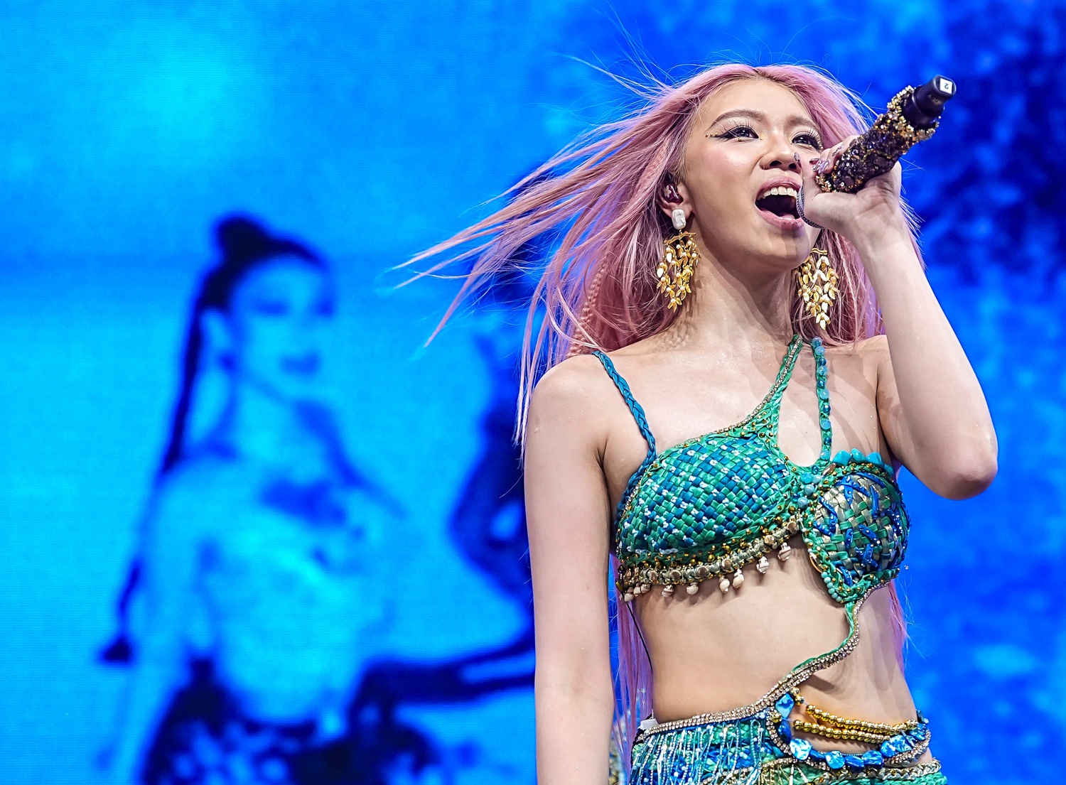 Stacey of Bini sings on the Mojave stage during Weekend 1 of the Coachella Valley Music and Arts Festival in Indio, Calif., Friday, April 10, 2026.