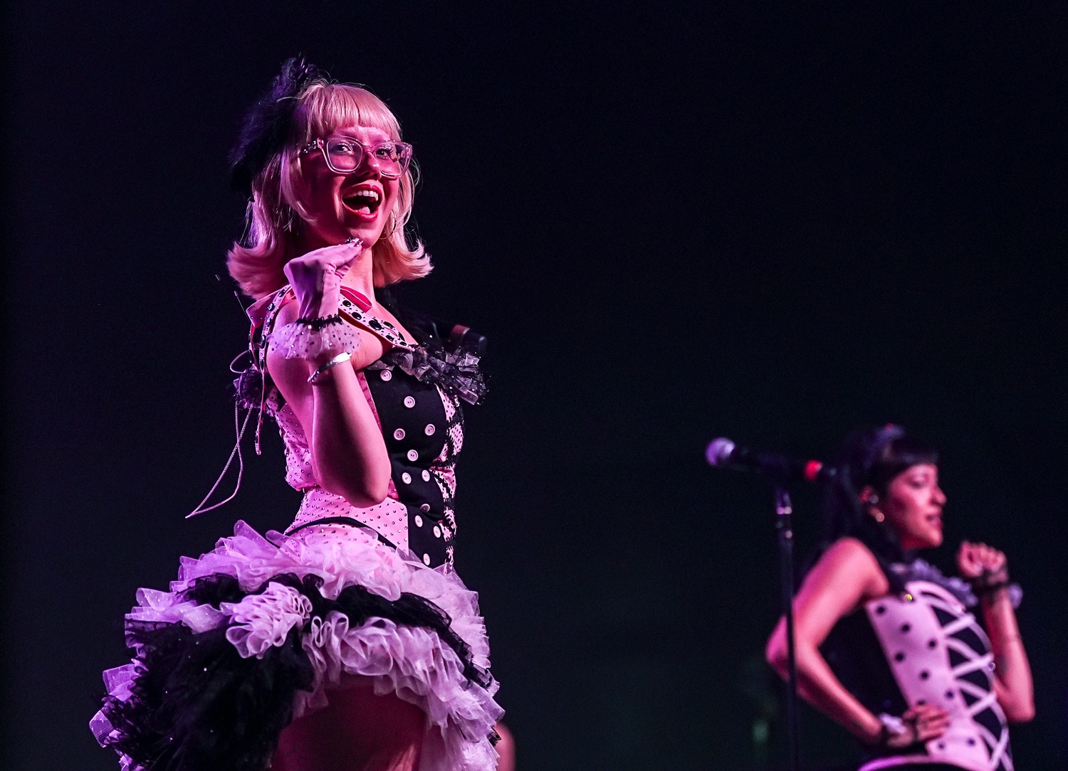 Andrea of The Two Lips smiles to the crowd while playing in the Sonora tent during Weekend 1 of the Coachella Valley Music and Arts Festival in Indio, Calif., Friday, April 10, 2026.