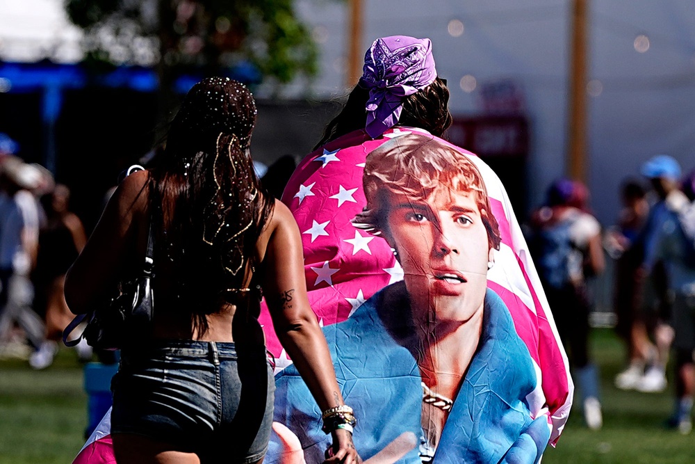 A Justin Beiber fan walks around the Empire Polo Club at the Coachella Valley Music and Arts Festival in Indio, Calif., on Saturday, April 11, 2026.