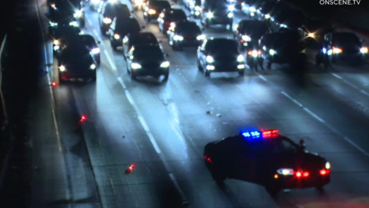 Scooter and other large objects thrown onto 110 Freeway in downtown LA
