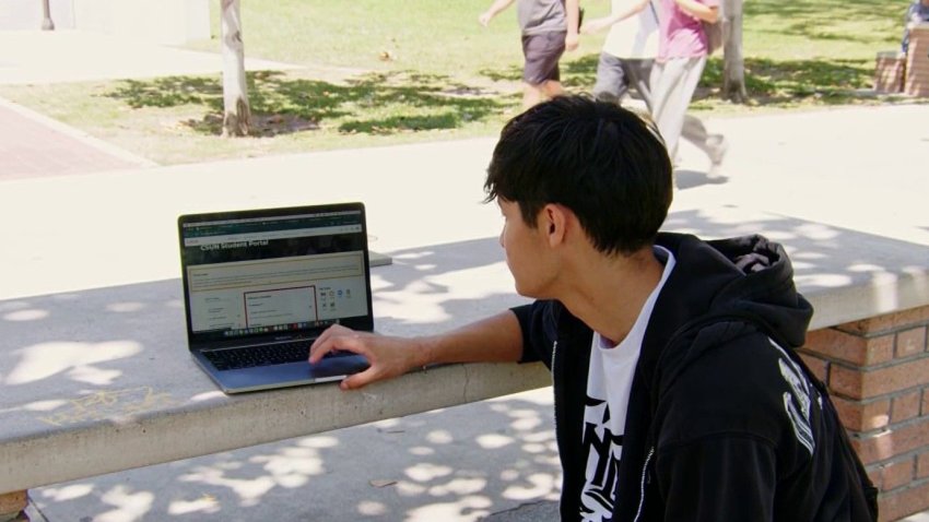 A student uses a laptop computer.
