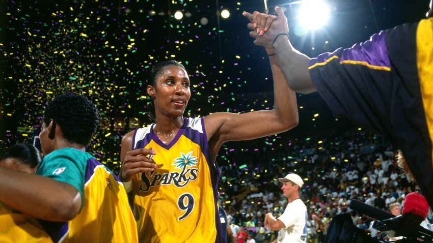 Lisa Leslie #9 of the Los Angeles Sparks celebrates after a win.