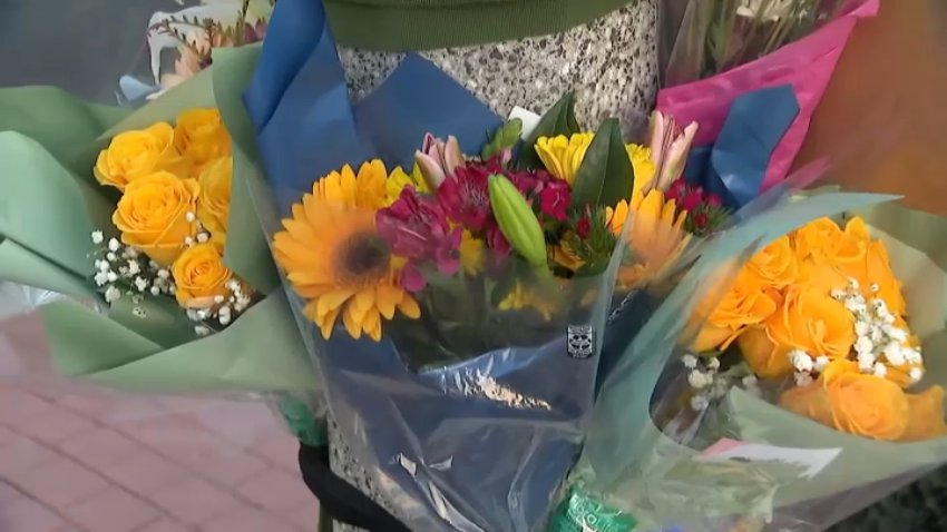 Flowers are set at a memorial site for a 13-year-old boy who crashed while driving an electric motorcycle in Garden Grove on Thursday, May 7, 2026.