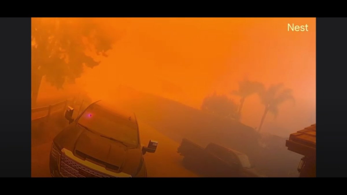 ‘Thought I'm going to die.' Simi Valley home camera captures woman's frantic evacuatio...
