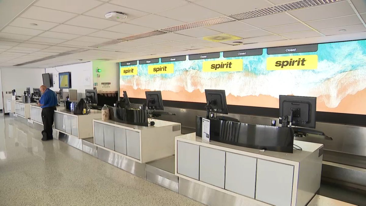 ‘It's crazy what's going on.' Spirit Airlines shutdown stranding LAX travelers