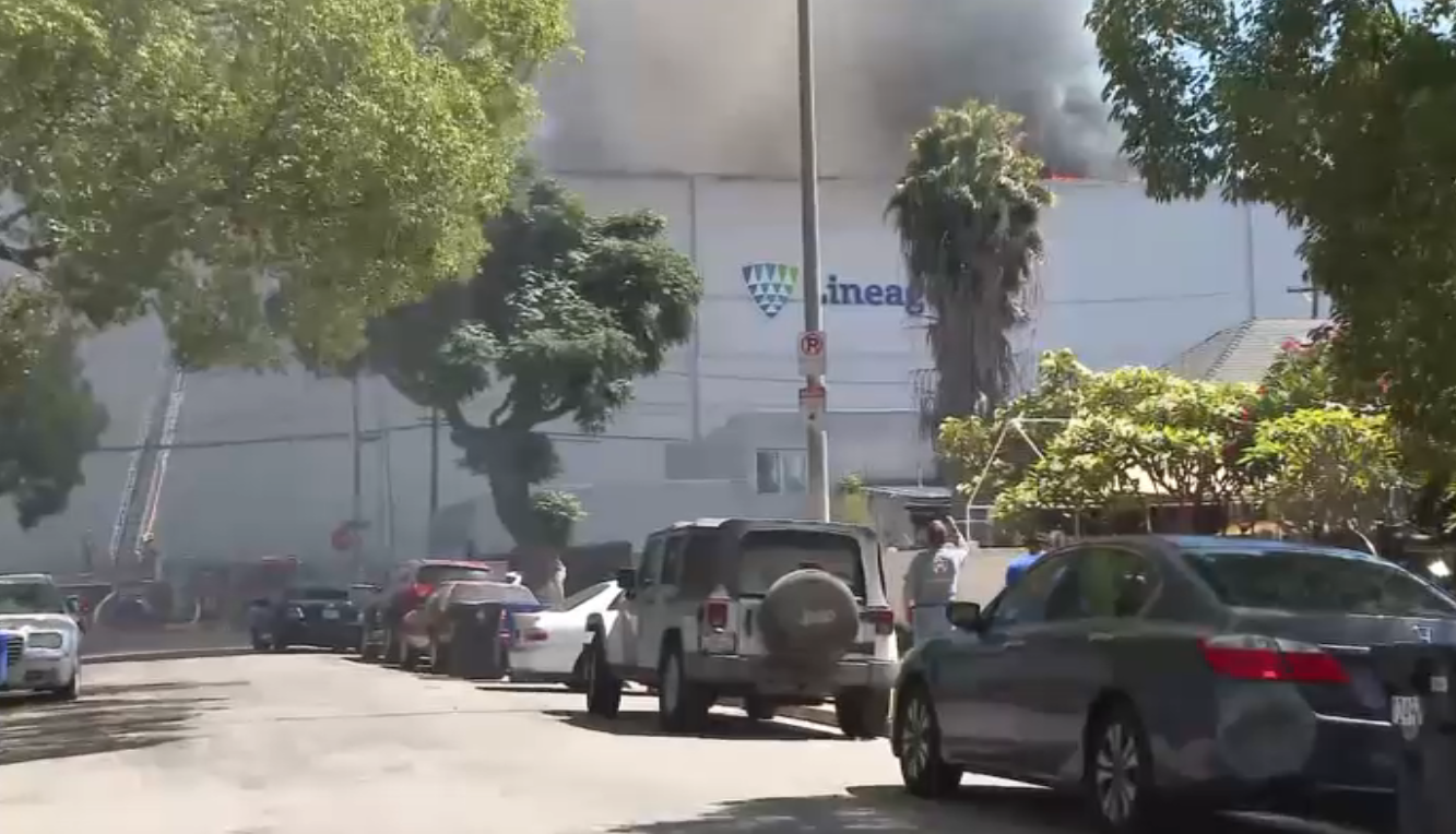 Firefighters attack fire at commercial building in Boyle Heights