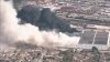 Flare-ups at Boyle Heights warehouse continue after shelter-in-place order lifted