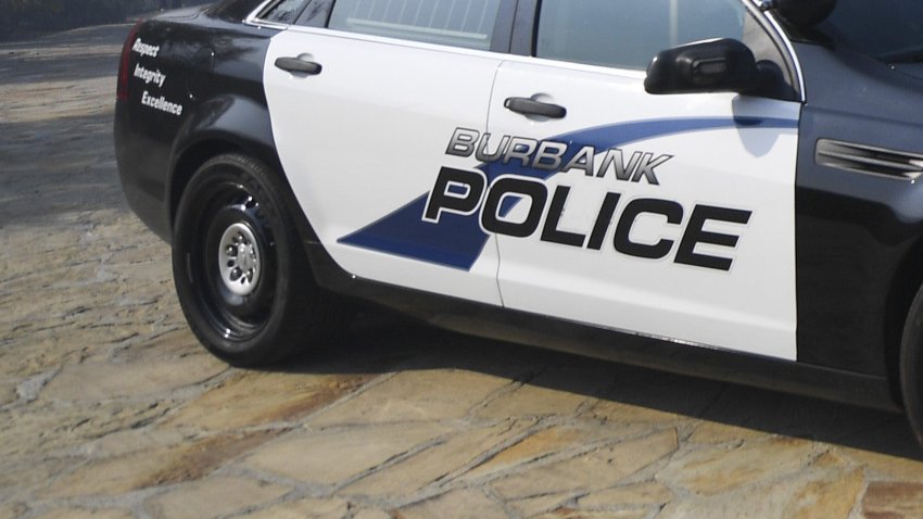 A Burbank Police Department cruiser patrols the neighborhood.
