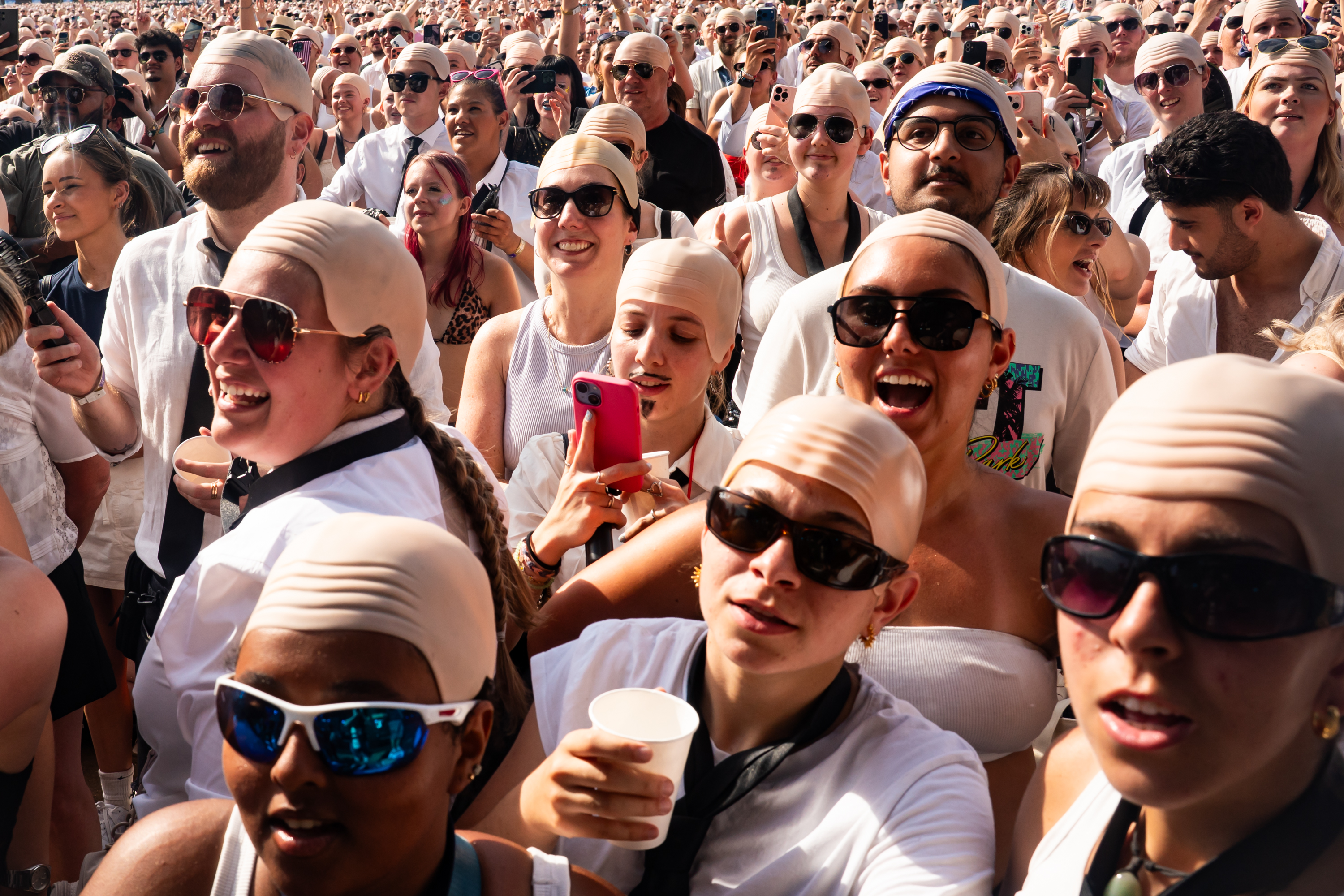Pitbull sets world record for largest gathering of people in bald caps ...