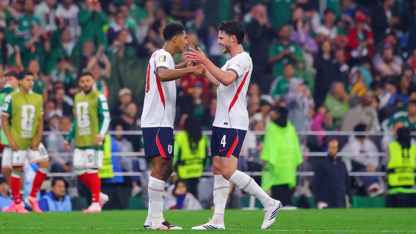 Jude Bellingham of England celebrates with teammate Declan Rice.