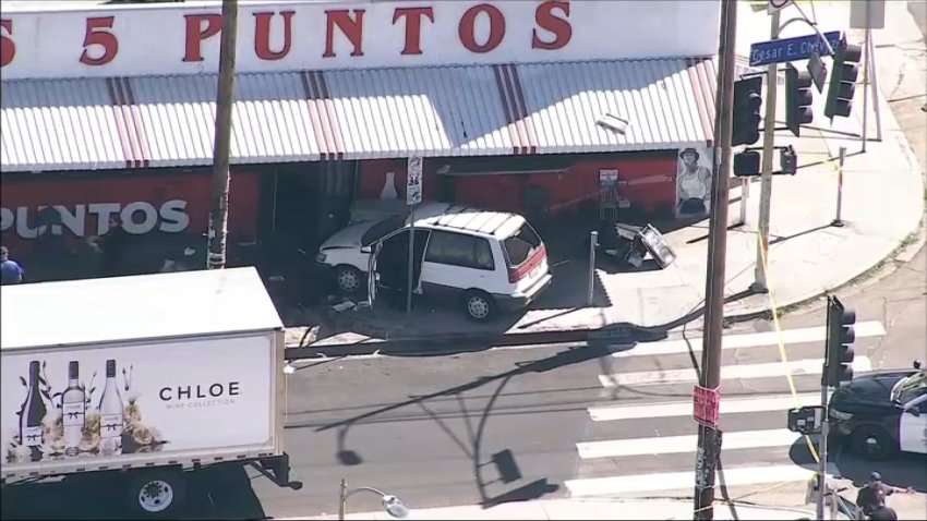 A three-vehicle crash resulted in a car stopping on the sidewalk of a restaurant in Boyle Heights on Tuesday, July 7, 2026.