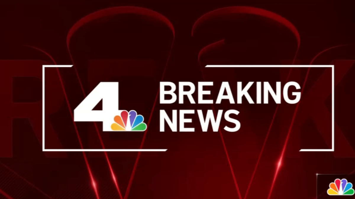 Vehicle submerged in water at harbor in Huntington Beach