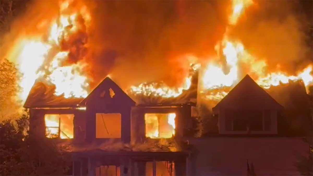Father dies after trying to save child from fire possibly sparked by fireworks
