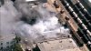 Fire at commercial building in Vernon sends plume of smoke into sky