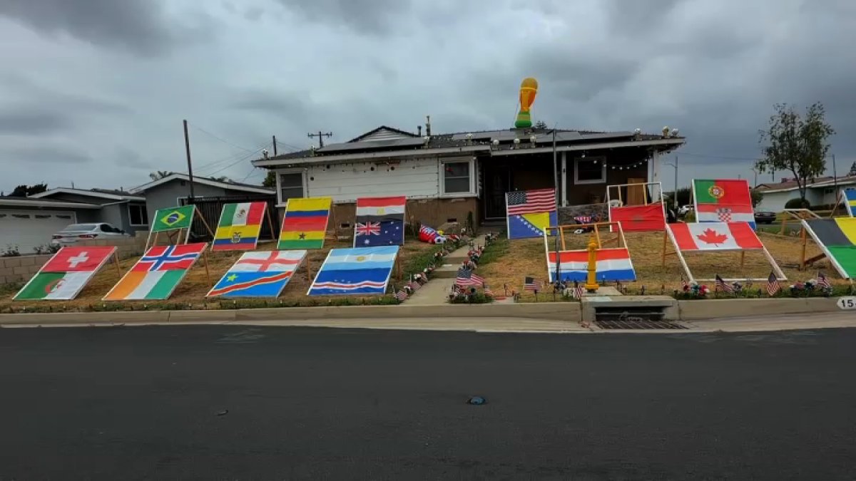 Soccer fan turns his La Mirada front yard into a World Cup bracket display