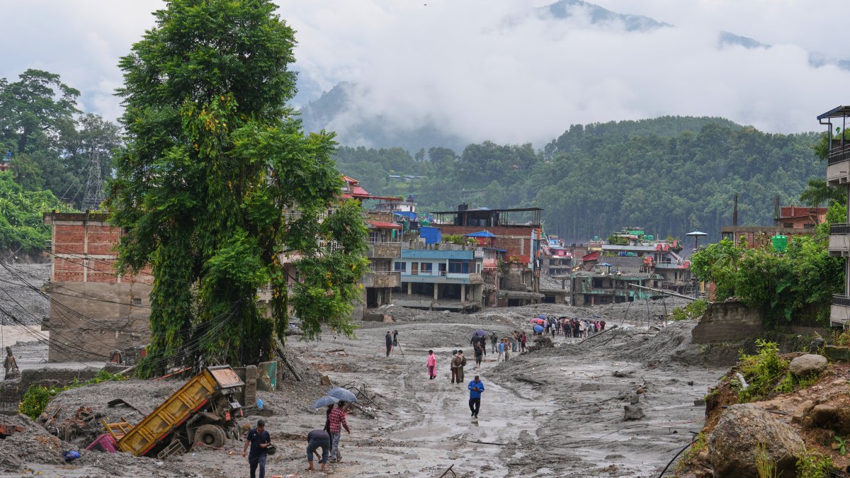 Nepal-China flood survivors reach safe areas as families await news of nearly 3,000 missing