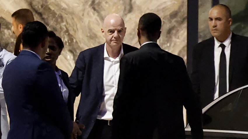 FIFA President Gianni Infantino (C) leaves Al-Madina Stadium in Rabat on Aug. 5, 2026.