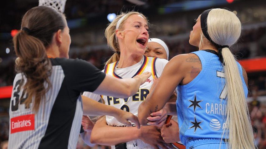 Sophie Cunningham #8 of the Indiana Fever reacts to DiJonai Carrington #7 of the Chicago Sky.
